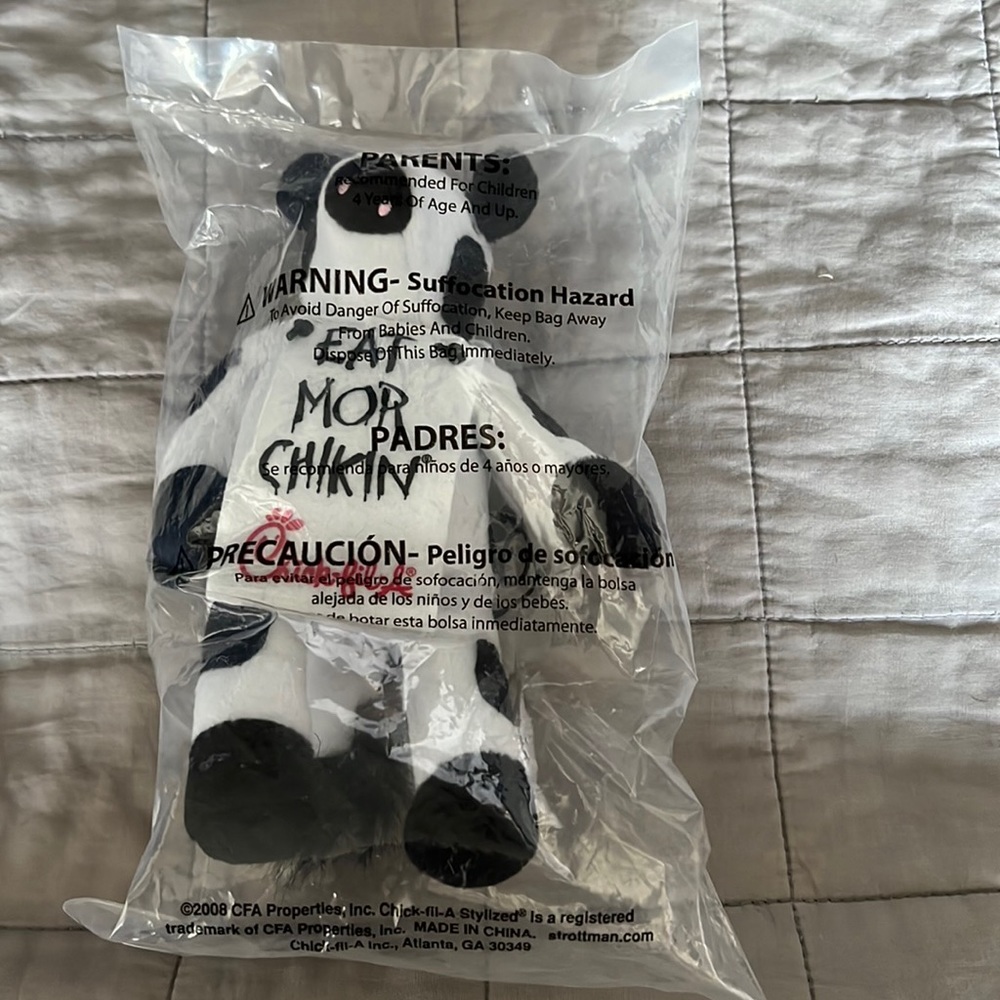 Chick-fil-A collectible stuffed cow in original packaging